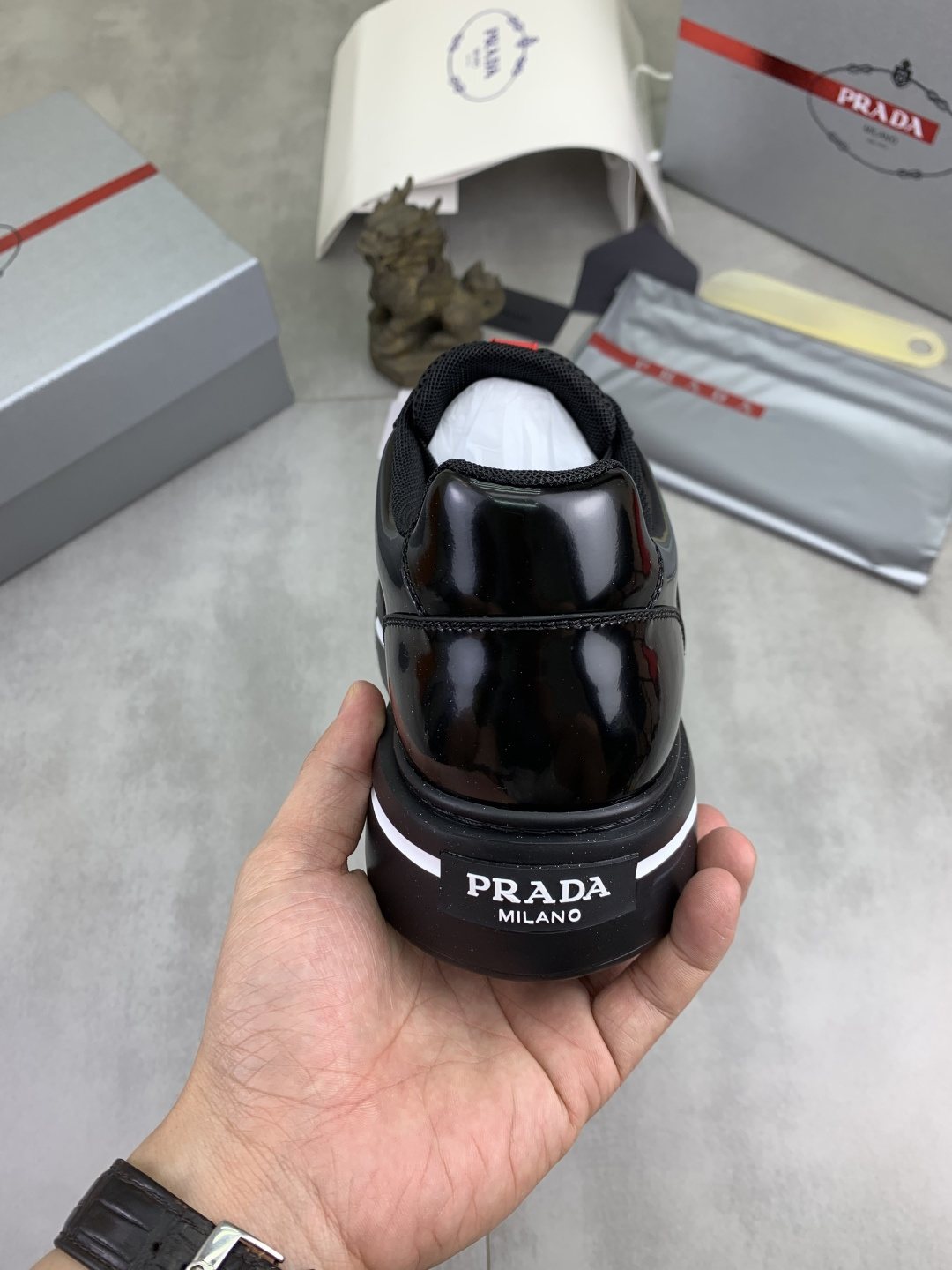Prada Triangle Patch Low-Top Sneakers