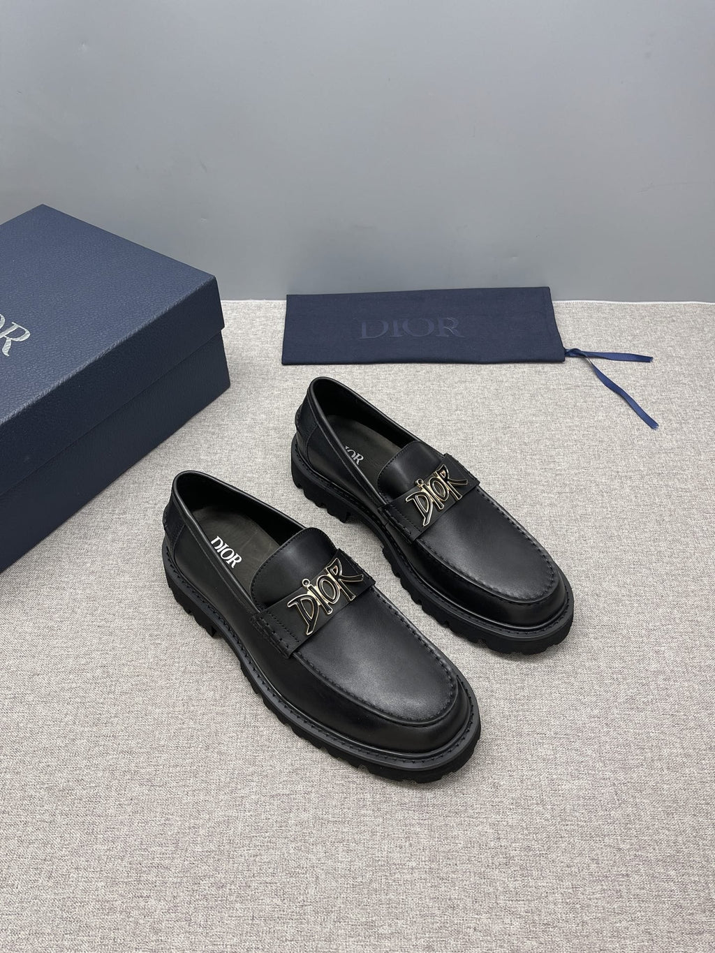 Dior Men's Black Gold-Plaque Slip-On Shoes